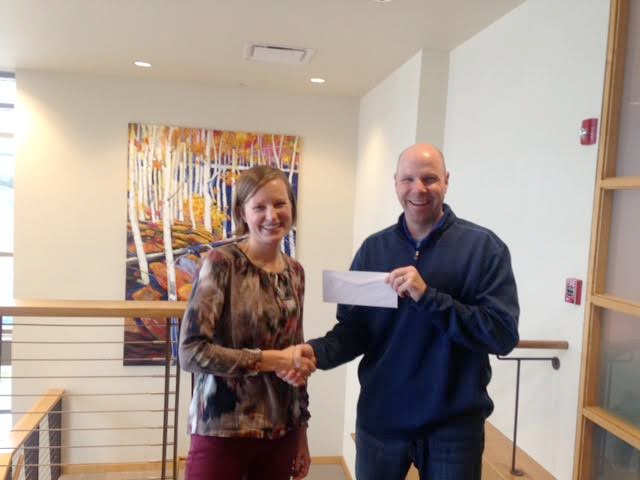 Liz receives her referral award.